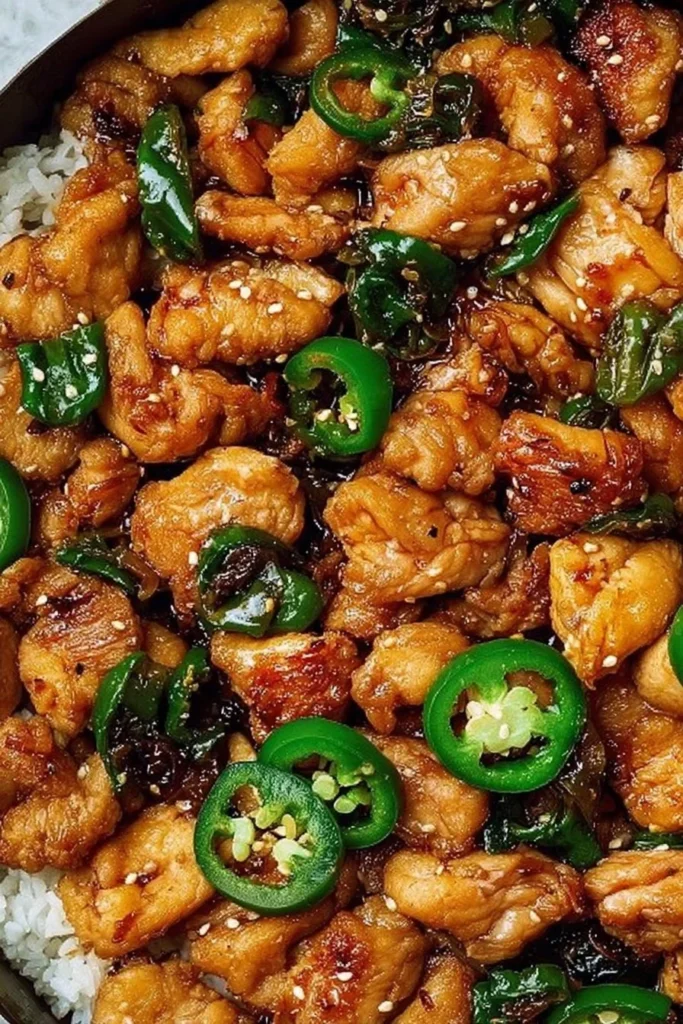 Spicy Jalapeño Chicken dish garnished with fresh herbs