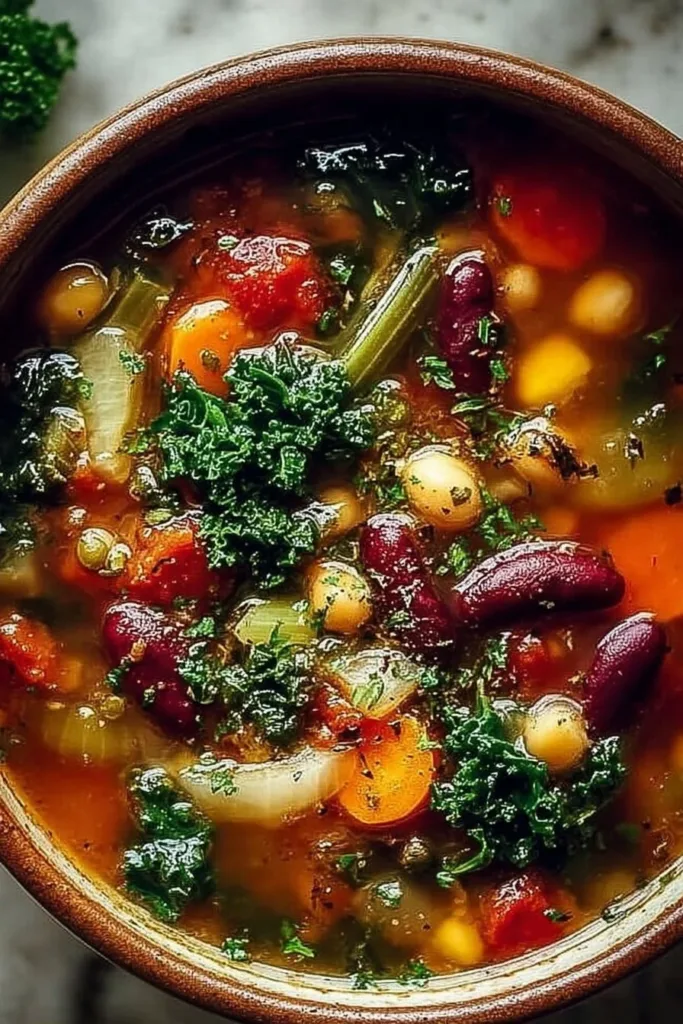 Cozy High-Protein Vegetable Soup 2 Bowl of cozy high-protein vegetable soup filled with colorful vegetables and herbs