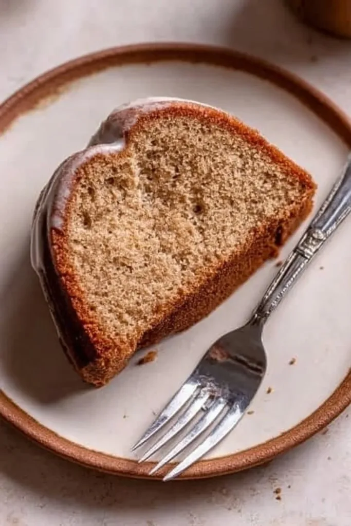 Delicious spiced Bundt cake served on a rustic wooden table