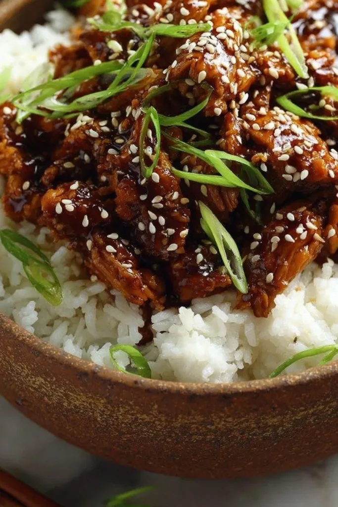 Delicious Dump and Go Crockpot Teriyaki Chicken dish served in a bowl