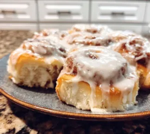 Freshly baked sourdough discard cinnamon rolls with icing