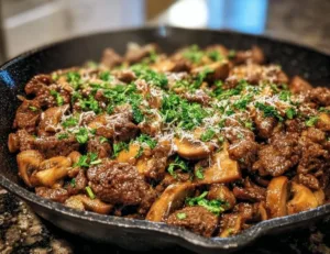 One Pan Beef and Mushroom Skillet meal served in a cast iron pan
