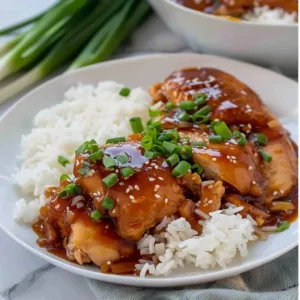 Crockpot Spicy Honey Garlic Chicken 3 Crockpot Spicy Honey Garlic Chicken garnished and ready to serve