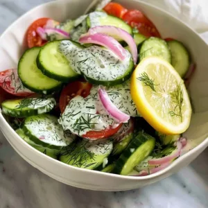 Fresh Cucumber Tomato Salad with herbs in a bowl