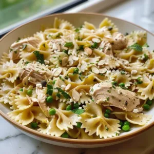 Easy lemon chicken pasta salad with fresh herbs and vibrant vegetables