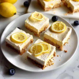 Greek Yogurt Lemon Bars 3 Creamy Greek Yogurt Lemon Bars topped with zest and a buttery crust
