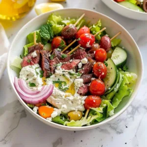 Delicious Mediterranean steak bowls with fresh ingredients and vibrant colors.