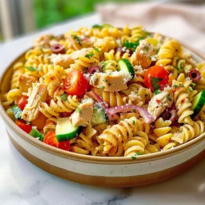 Tasty chicken pasta salad with colorful veggies and Italian dressing