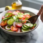 Fresh Cucumber Tomato Salad with vibrant vegetables and dressing