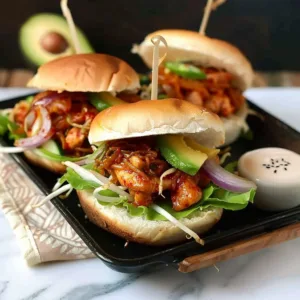 Slow Cooker Korean Chicken Sliders 3 Delicious Slow Cooker Korean Chicken Sliders served on a platter