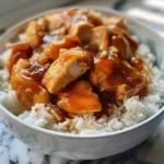 Honey Garlic Crock Pot Chicken served over rice