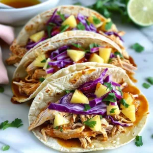 Delicious shredded BBQ chicken tacos served with fresh toppings